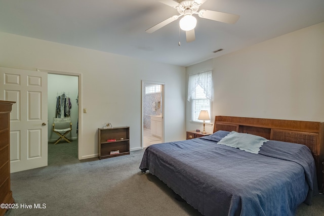 315 Thomas Pl, Washington, NC 27889 - carpeted bedroom with connected bathroom and ceiling fan