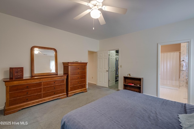 315 Thomas Pl, Washington, NC 27889 - carpeted bedroom featuring connected bathroom, a ceiling fan, and baseboards