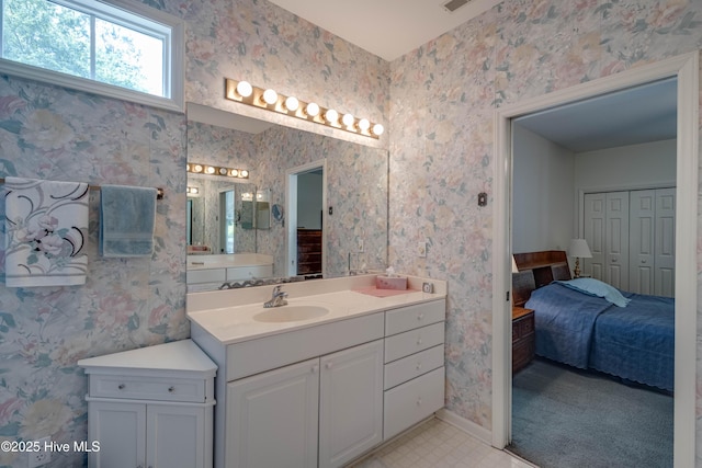 315 Thomas Pl, Washington, NC 27889 - full bath with baseboards, vanity, and wallpapered walls