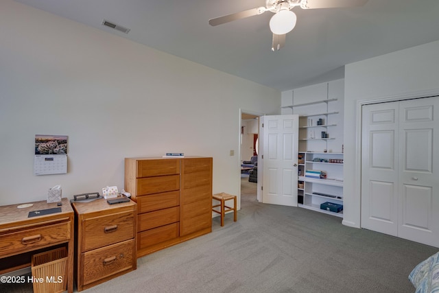 315 Thomas Pl, Washington, NC 27889 - bedroom with light carpet, a closet, an office area, and a ceiling fan