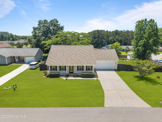 119 Cobblestone Trl, Jacksonville, NC 28546 - view of front of home with driveway, a garage, and covered porch
