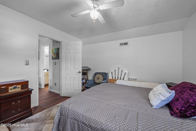 119 Cobblestone Trl, Jacksonville, NC 28546 - bedroom with wood finished floors, lofted ceiling, a ceiling fan, a textured ceiling, and baseboards