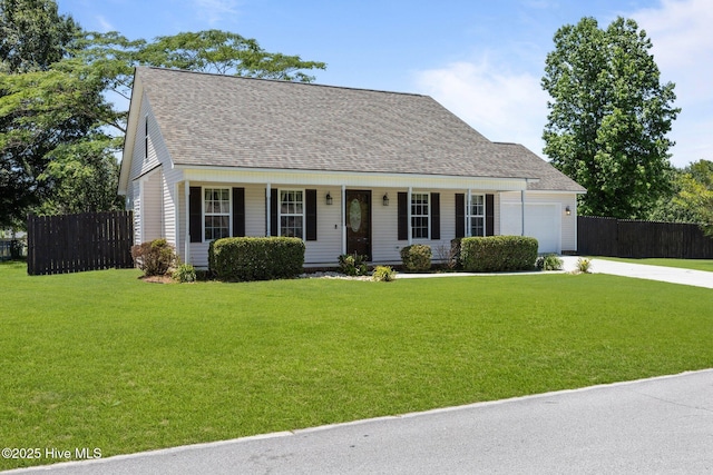 119 Cobblestone Trl, Jacksonville, NC 28546 - cape cod house with driveway, a garage, covered porch, and roof with shingles