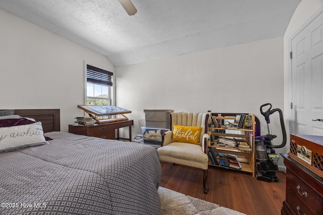 119 Cobblestone Trl, Jacksonville, NC 28546 - bedroom with wood finished floors, vaulted ceiling, a textured ceiling, and a ceiling fan