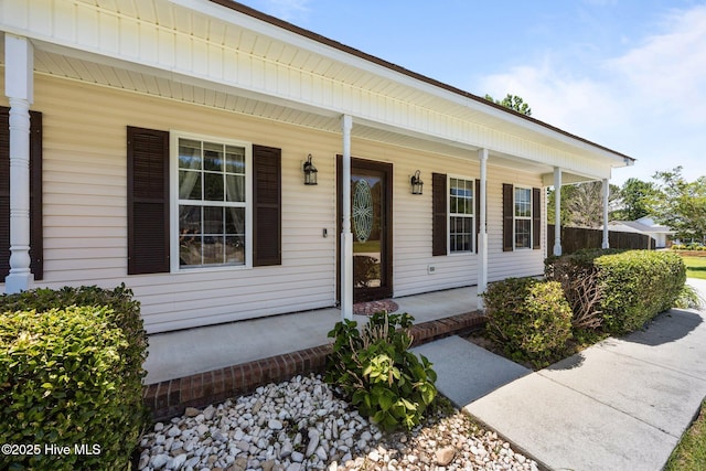 119 Cobblestone Trl, Jacksonville, NC 28546 - doorway to property featuring covered porch