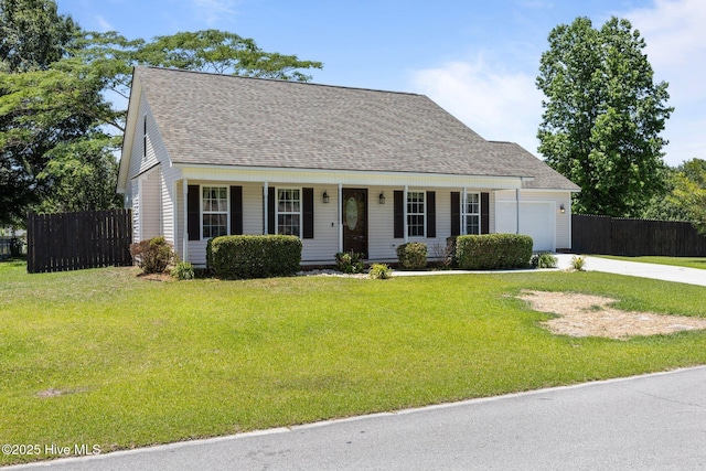 119 Cobblestone Trl, Jacksonville, NC 28546 - new england style home with driveway, a garage, a porch, and a shingled roof