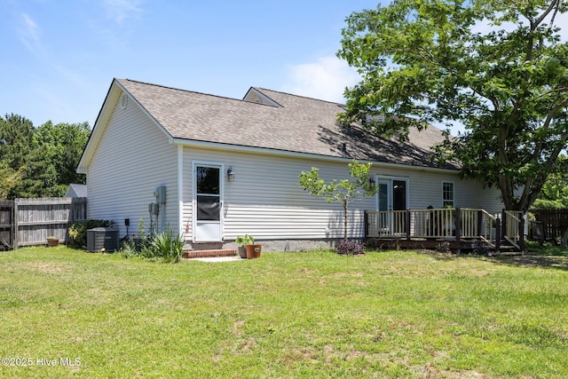 119 Cobblestone Trl, Jacksonville, NC 28546 - rear view of property featuring a deck, a shingled roof, and central AC unit