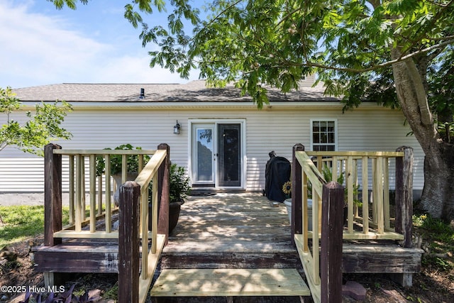 119 Cobblestone Trl, Jacksonville, NC 28546 - back of property featuring a deck and roof with shingles