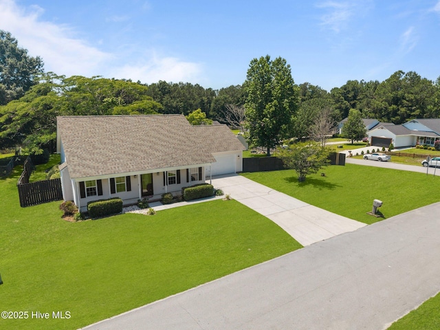 119 Cobblestone Trl, Jacksonville, NC 28546 - view of front of house featuring covered porch, driveway, and an attached garage