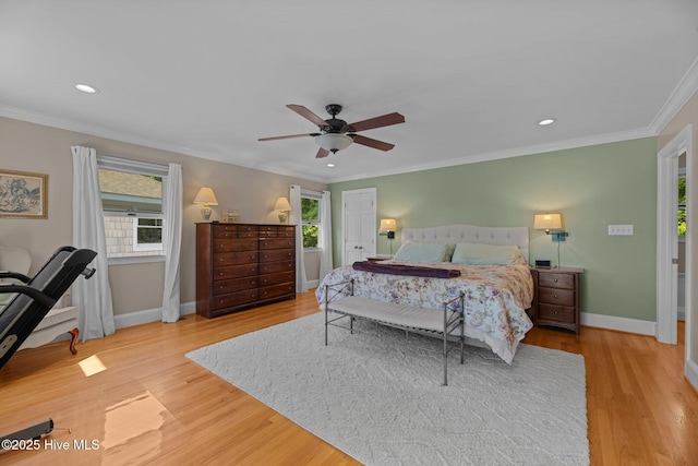 1404 Tosto Cir Apt 5, Oriental, NC 28571 - bedroom with multiple windows, wood finished floors, baseboards, recessed lighting, and ornamental molding