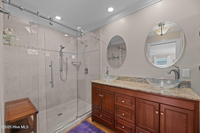 1404 Tosto Cir Apt 5, Oriental, NC 28571 - full bath with a stall shower, double vanity, ornamental molding, recessed lighting, and wood finished floors