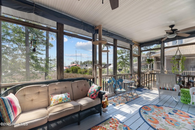 1404 Tosto Cir Apt 5, Oriental, NC 28571 - sunroom with a ceiling fan and an outdoor hangout area