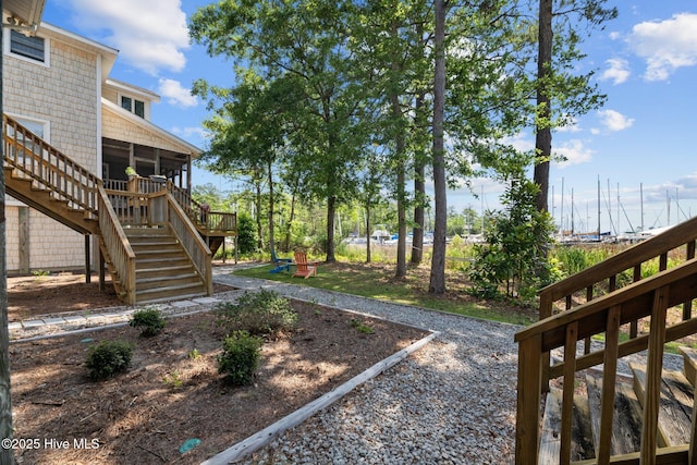 1404 Tosto Cir Apt 5, Oriental, NC 28571 - view of yard featuring stairway and a sunroom