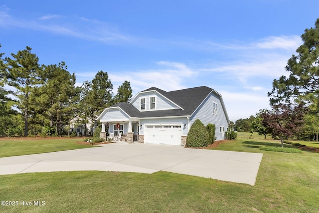 115 Norman Cir, Aberdeen, NC 28315 - view of front of property featuring a front yard, stone siding, driveway, and covered porch