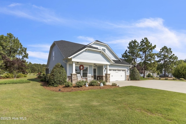115 Norman Cir, Aberdeen, NC 28315 - craftsman-style house with a porch, concrete driveway, a front lawn, and an attached garage