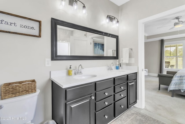 115 Norman Cir, Aberdeen, NC 28315 - ensuite bathroom with toilet, double vanity, a ceiling fan, ornamental molding, and baseboards
