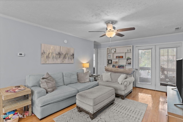 1825 Savannah Ct Unit D3, Wilmington, NC 28403 - living area with a ceiling fan, light wood finished floors, ornamental molding, and a textured ceiling