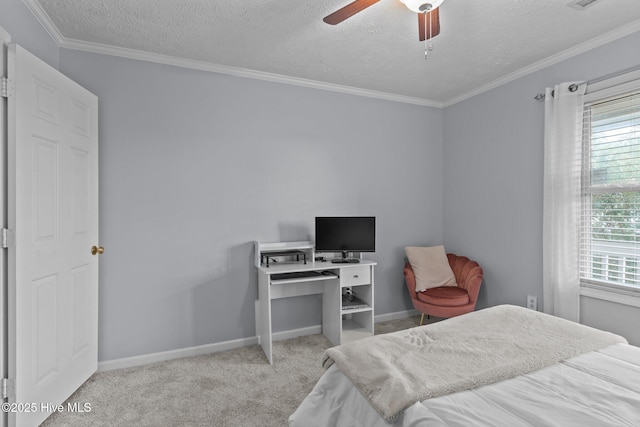1825 Savannah Ct Unit D3, Wilmington, NC 28403 - carpeted bedroom featuring a textured ceiling, baseboards, crown molding, and a ceiling fan