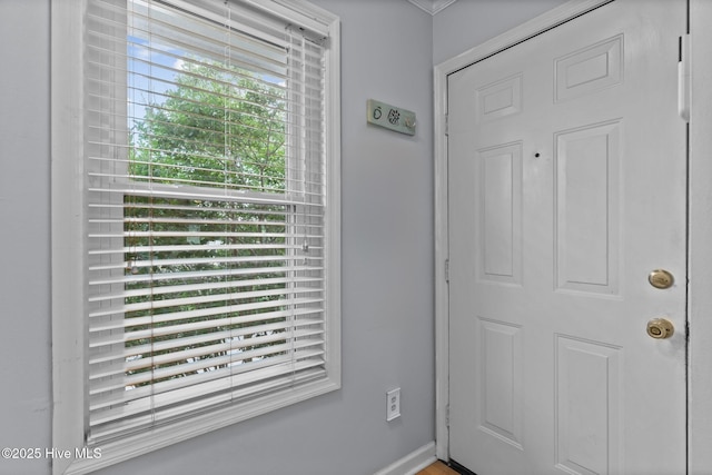 1825 Savannah Ct Unit D3, Wilmington, NC 28403 - doorway to outside with baseboards