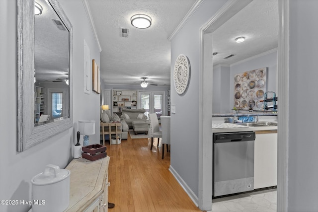 1825 Savannah Ct Unit D3, Wilmington, NC 28403 - corridor featuring a textured ceiling and baseboards