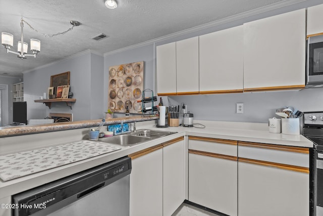 1825 Savannah Ct Unit D3, Wilmington, NC 28403 - kitchen featuring stainless steel appliances, a sink, white cabinetry, light countertops, and ornamental molding