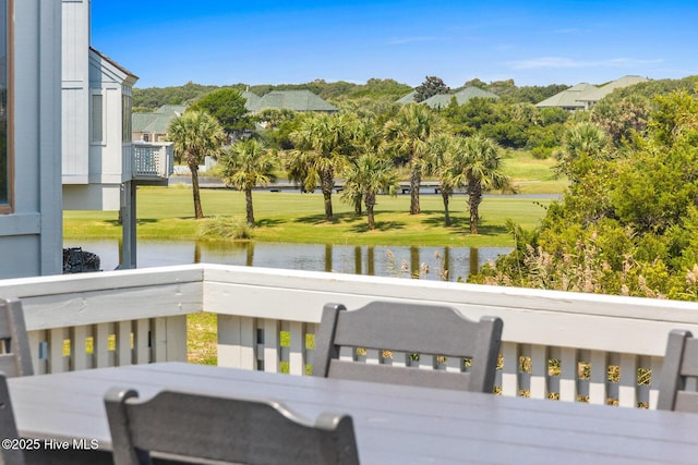 305 S Bald Head Wynd Wynd Unit 16, Bald Head Island, NC 28461 - wooden deck featuring a water view