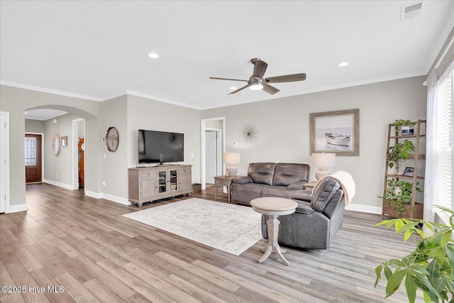 3213 Laughing Gull Ter, Wilmington, NC 28412 - living area featuring arched walkways, baseboards, ceiling fan, light wood finished floors, and recessed lighting
