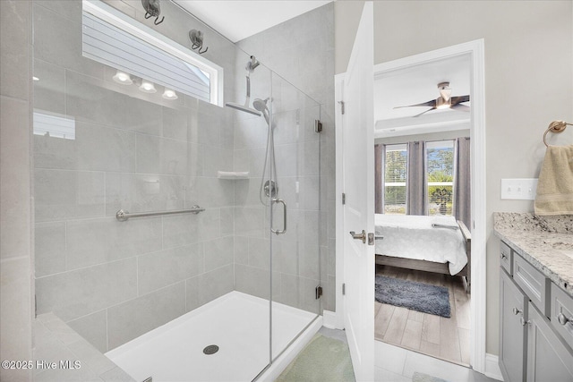 3213 Laughing Gull Ter, Wilmington, NC 28412 - ensuite bathroom featuring a shower stall, vanity, and tile patterned floors