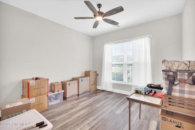 3213 Laughing Gull Ter, Wilmington, NC 28412 - home office with wood finished floors, a ceiling fan, and baseboards