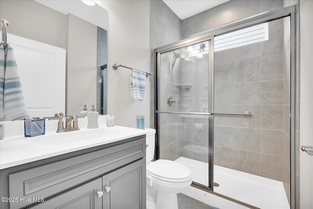 3213 Laughing Gull Ter, Wilmington, NC 28412 - bathroom with vanity, toilet, and a shower stall