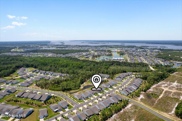 3213 Laughing Gull Ter, Wilmington, NC 28412 - aerial view of property's location with nearby suburban area and a large body of water