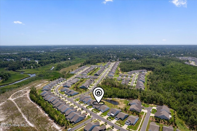 3213 Laughing Gull Ter, Wilmington, NC 28412 - aerial perspective of suburban area with a heavily wooded area
