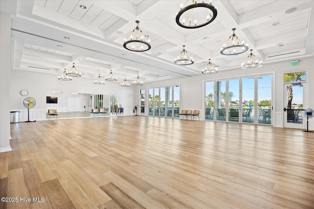 3213 Laughing Gull Ter, Wilmington, NC 28412 - workout room with a chandelier, coffered ceiling, and light wood finished floors