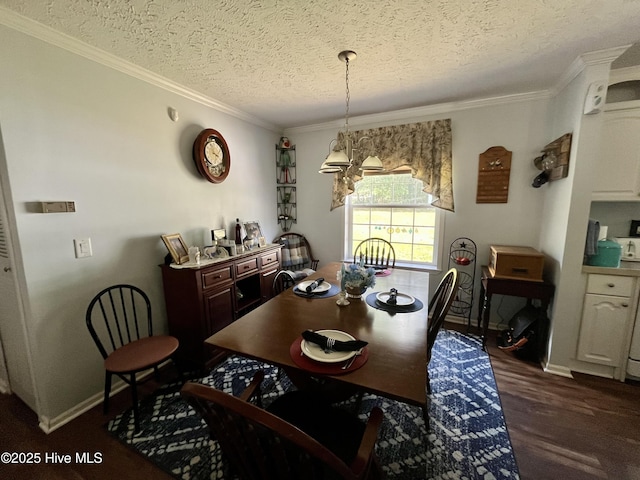 22541 Henry St, Laurel Hill, NC 28351 - dining room featuring a textured ceiling, dark wood-type flooring, ornamental molding, and baseboards