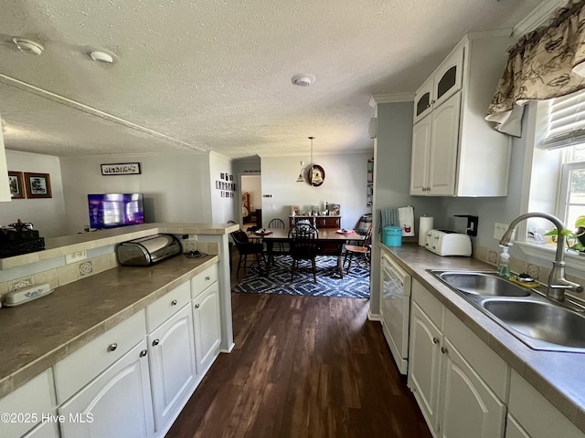 22541 Henry St, Laurel Hill, NC 28351 - kitchen featuring a sink, white cabinets, dishwasher, dark wood-style floors, and a textured ceiling