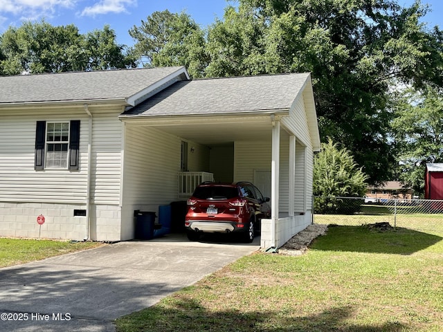22541 Henry St, Laurel Hill, NC 28351 - view of side of home featuring driveway, a carport, a shingled roof, and crawl space