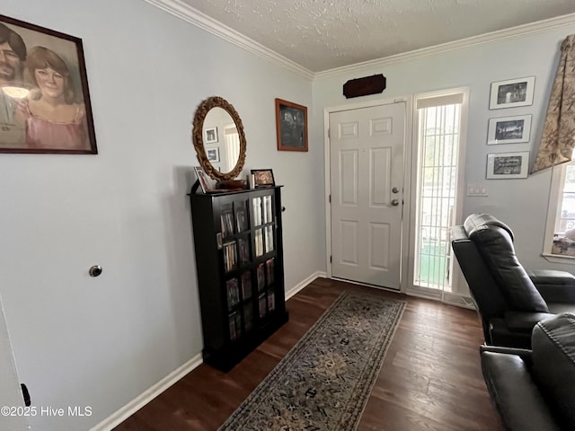 22541 Henry St, Laurel Hill, NC 28351 - foyer with dark wood-style flooring, healthy amount of natural light, crown molding, baseboards, and a textured ceiling