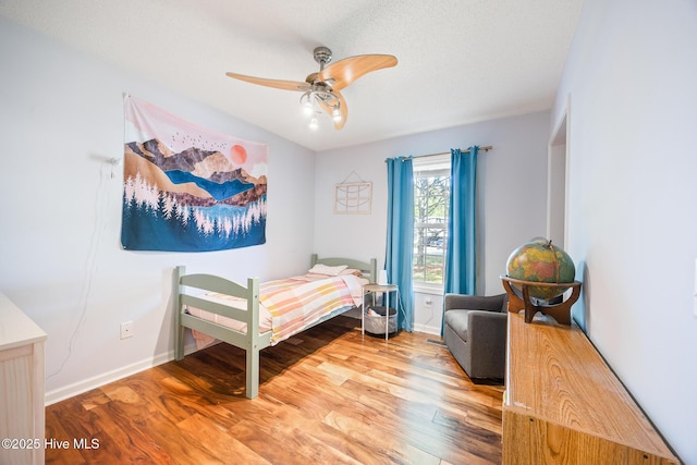 130 Woodgreen Ln, Aberdeen, NC 28315 - bedroom with wood finished floors, baseboards, and a ceiling fan
