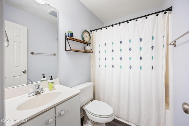 130 Woodgreen Ln, Aberdeen, NC 28315 - full bath with toilet, vanity, shower / bath combo, and a textured ceiling