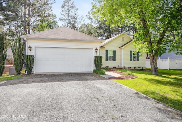 130 Woodgreen Ln, Aberdeen, NC 28315 - single story home featuring gravel driveway and an attached garage