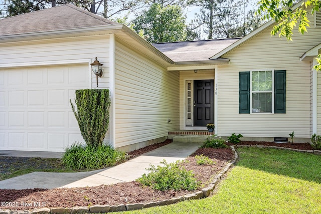 130 Woodgreen Ln, Aberdeen, NC 28315 - doorway to property featuring a garage, a yard, and roof with shingles