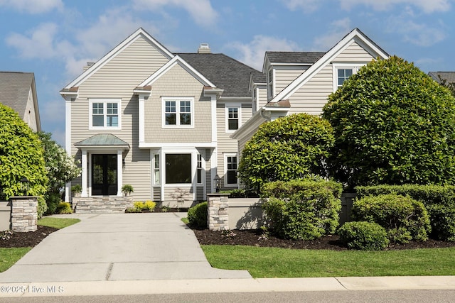 1401 Regatta Dr, Wilmington, NC 28405 - view of front of property featuring a chimney