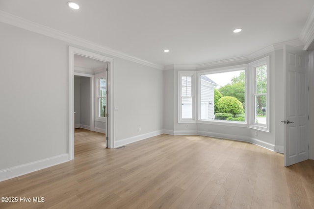 1401 Regatta Dr, Wilmington, NC 28405 - empty room featuring ornamental molding, baseboards, light wood-style flooring, and recessed lighting