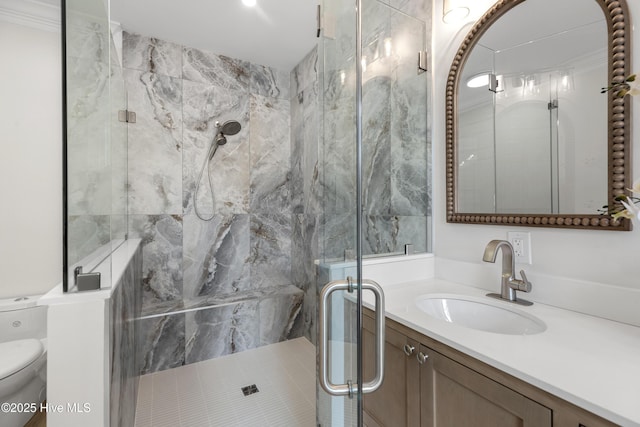 1401 Regatta Dr, Wilmington, NC 28405 - bathroom featuring toilet, vanity, and a marble finish shower