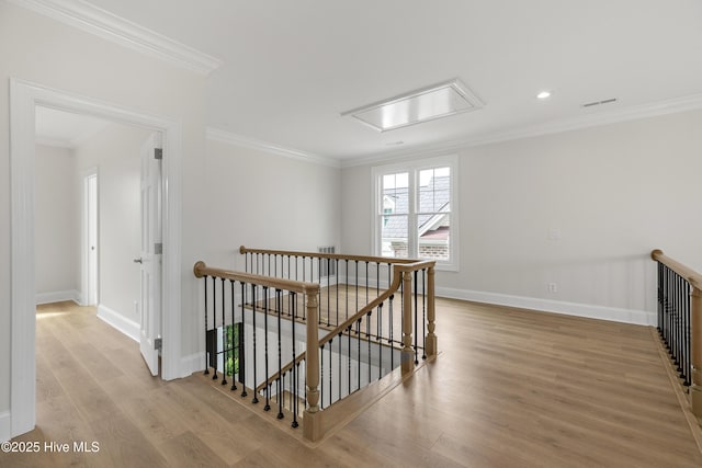 1401 Regatta Dr, Wilmington, NC 28405 - hall with an upstairs landing, light wood-type flooring, crown molding, baseboards, and recessed lighting