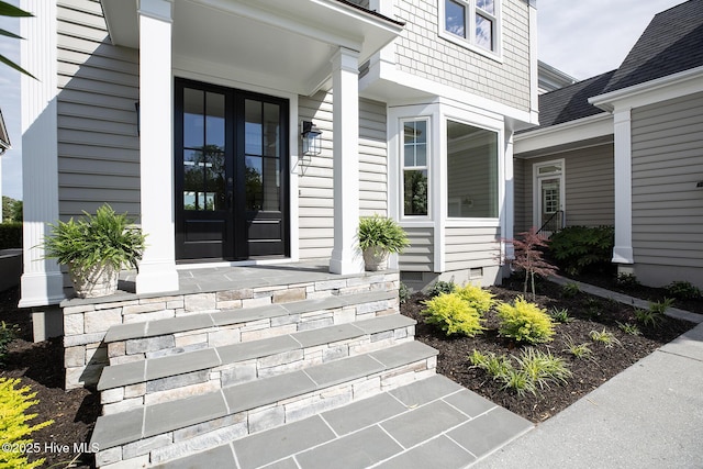 1401 Regatta Dr, Wilmington, NC 28405 - entrance to property featuring a porch and french doors