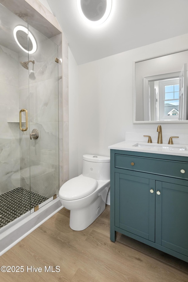1401 Regatta Dr, Wilmington, NC 28405 - full bath featuring toilet, wood finished floors, a shower stall, and vanity