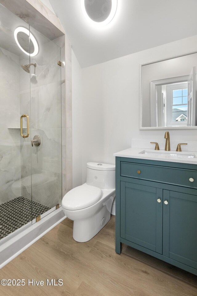 1401 Regatta Dr, Wilmington, NC 28405 - full bath with toilet, wood finished floors, a shower stall, and vanity