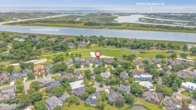 1401 Regatta Dr, Wilmington, NC 28405 - aerial view of property's location featuring a large body of water and nearby suburban area