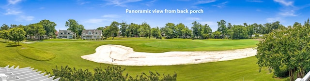 1401 Regatta Dr, Wilmington, NC 28405 - view of property's community featuring view of golf course, view of scattered trees, and a yard